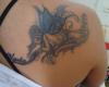 http://www.tattooset.com/images/tattoo/2013/05/14/18353-tattoo-esmit-hada-acostada_tiny.jpg