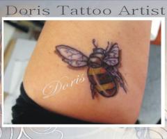 bee tattoo by Doris tattoo
