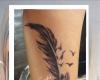 feather tattoo by Doris tattoo