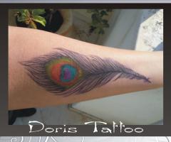 Peacock feather tattoo by Doris tattoo