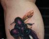 Tatuaggio volare su una bocca