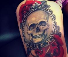 Portrait by skull tattoo