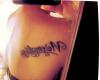 Back letters tattoo