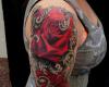Tatuaje de rosas en hombre de mujer