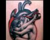 Tatuaje de corazon y realismo