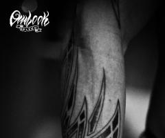 Tribal tattoo arm