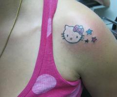 Hello Kitty with stars tattoo