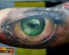 Ojo color verde tatuaje realista