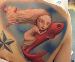 Girls with fish tattoo