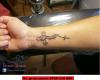 small cross tattoo by Tatuaje Brasov Beatris