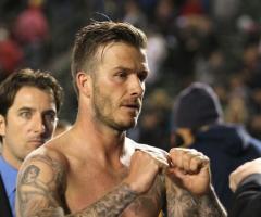 David Beckham detalle sobre sus tatuajes en los brazos