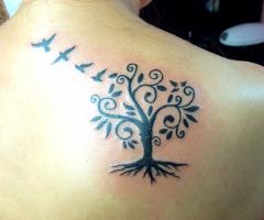 Tree of life bird tattoo