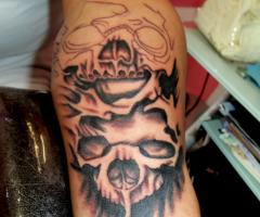 Skull tattoo on arm