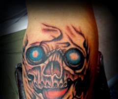 Skull tattoo by Daphne Tattoox