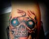 Skull tattoo by Daphne Tattoox