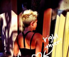 Miley Cyrus arrow tattoo