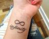 Infinity symbol and text tattoo