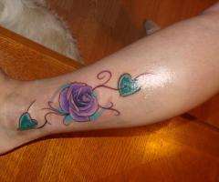 Violet rose with hearts tattoo