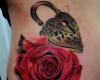 Rose with lock tattoo