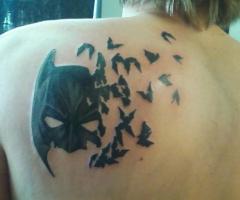 Batman mask and bats tattoo