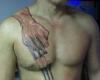 Wolverine tattoo on chest