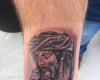 Tatuaje pequeño de Jesús