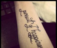 Tatouage pursuit of happiness