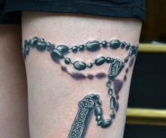 Garter Belt Rosary tattoo