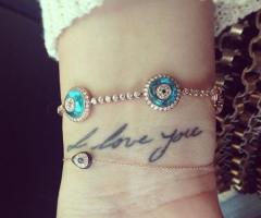 Khloe Kardashian letter father tattoo