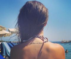 Lucy Watson In love we trust tattoo