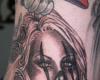Clown girl tattoo