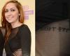 Brandi Cyrus rib cage tattoo