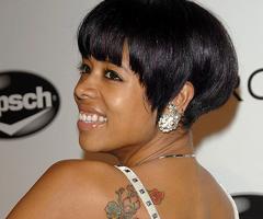 Kelis flowery tattoo
