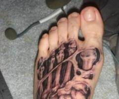 3D bones on foot tattoo