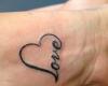 Love and heart tattoo