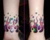Tatouage poignet flammes colorées