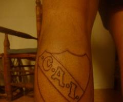 CAI tatuaje