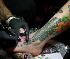 Animal print foot tattoo