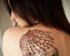 Tatuaje de Buho en la espalda