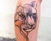 Tatuaje de felino en la pierna