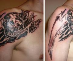 Tatuaje de la muerte saliendo del cuerpo