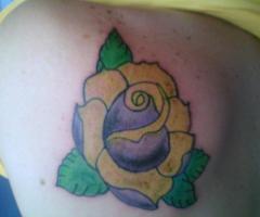 Tatuaje de flor rosa