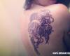 Jacqui Sandell shows off her jellyfish shoulder tattoo