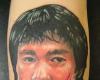 Bruce Lee portrait tattoo