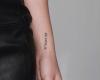 Olivia Wilde lettering tattoo