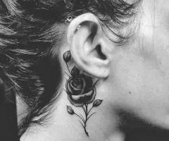Behind ear tattoo rose