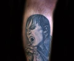 Johnny Depp brushing his fangs in Dark Shadows tattoo