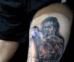 Manny Pacquiao tattoo on leg