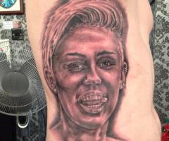 Fans tattoo Miley Cyrus