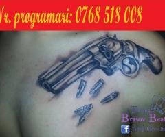 Gun tattoo by tatuaje brasov beatris
